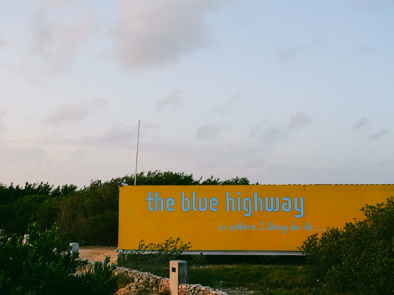 Roadside billboard against an open sky